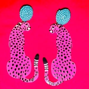 Very unique pink leopard earrings with turquoise earring post!
